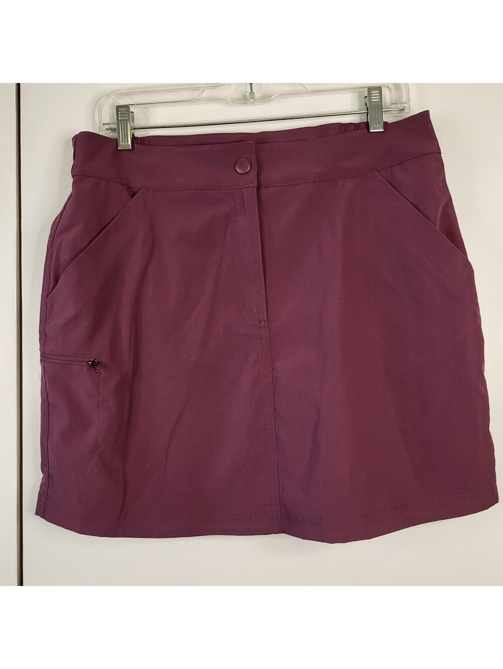 32 Degrees Cool Tech Skort in a  marve color with a side zipper pocket size Med